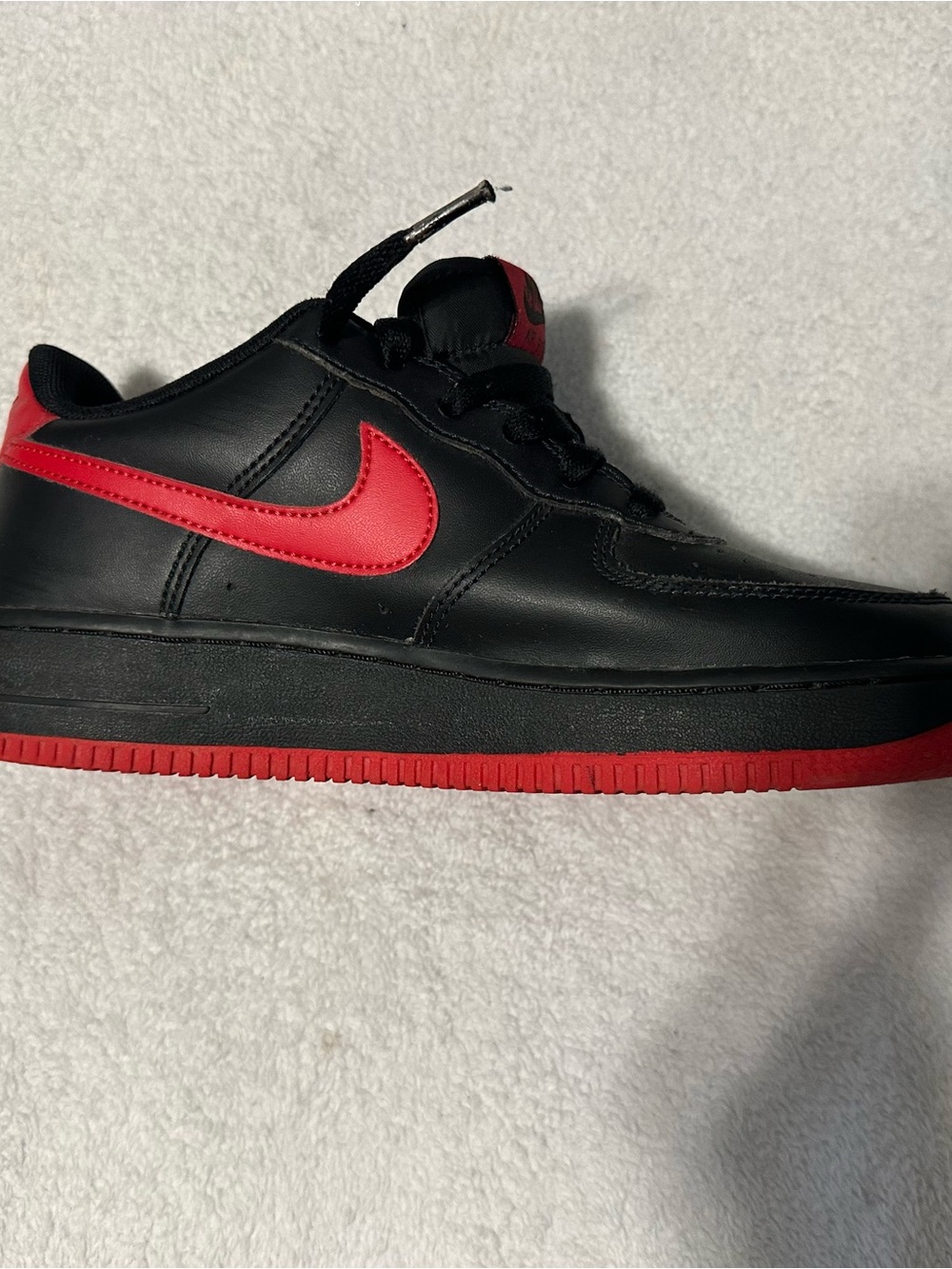 LIMITED EDITION Nike Black and Red Low-Top Swoosh Sneakers